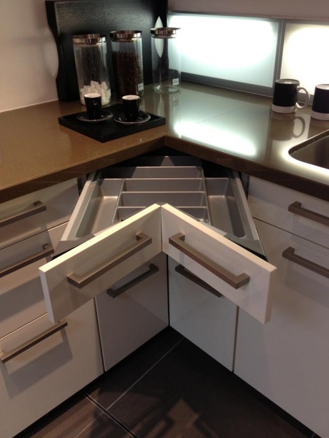 Ingenious corner drawers. Just one of a zillion storage options.