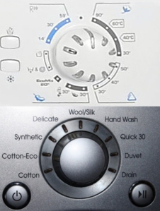 Top: The mystery that is French washing machines. Cycle selection is by temperature—in celsius no less. Why would I know that? Bottom: Blessed American laundry logic and simplicity.